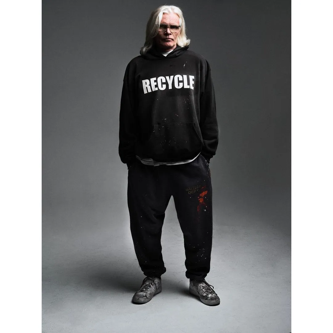 GALLERY DEPT. 90'S RECYCLE HOODIE WASHED BLACK 90'S washed hoodie with distressed eco-friendly slogans. Washed black S-XL. Ready-made garments are washed and dyed again. Multiple spots throughout the body are spray-faded. The ribs are cut and worn.